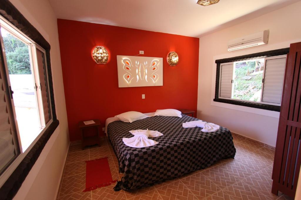 Pousada Casa De Pedra Boicucanga Rum bild